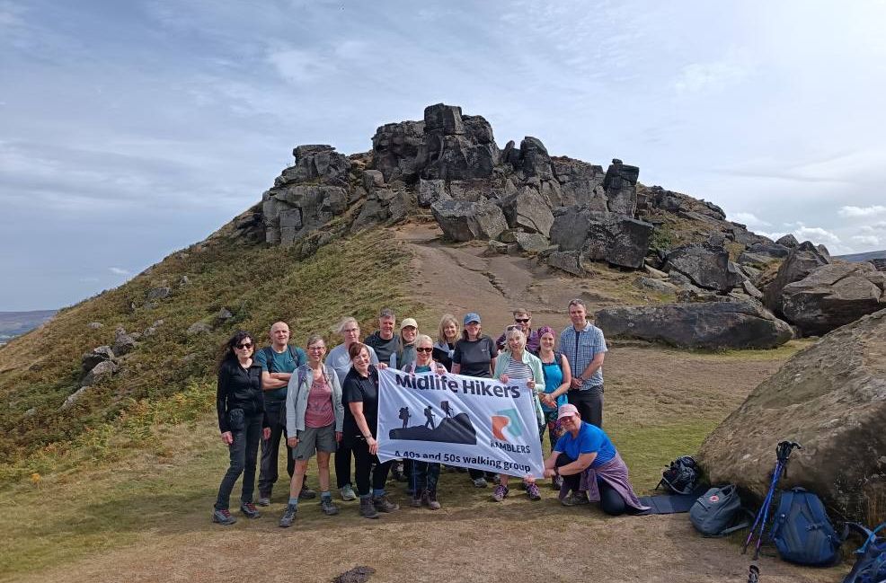 Midlife Hikers at the Wainstones with our flag